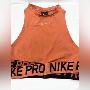 NIKE PRO WOMENS CROPPED TANK TOP IN ORANGE/BLACK SIZE M